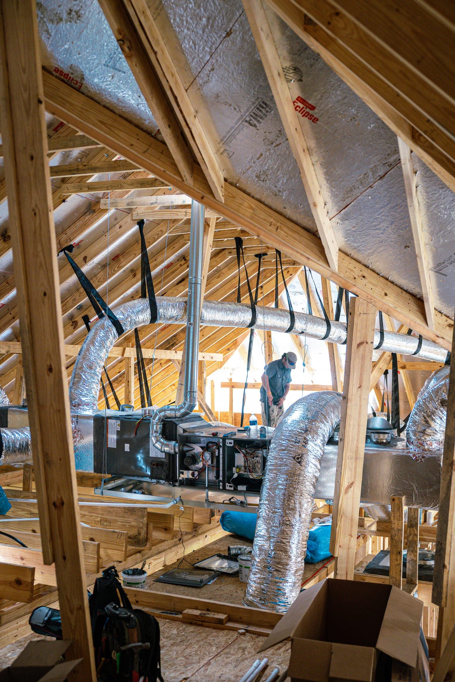 An HVAC install in a new-build attic